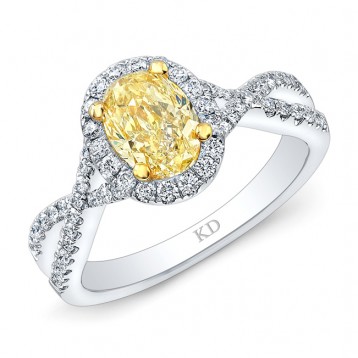 WHITE AND YELLOW GOLD TWISTED FANCY YELLOW OVAL DIAMOND HALO RING